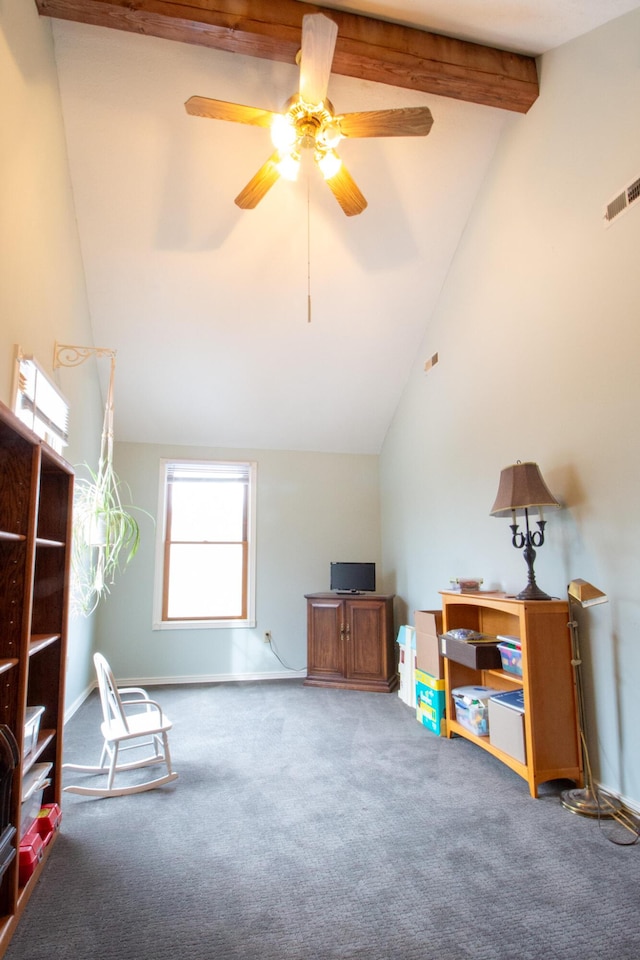 misc room with ceiling fan, high vaulted ceiling, beamed ceiling, and carpet