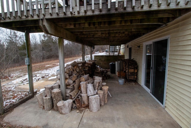 view of snow covered patio