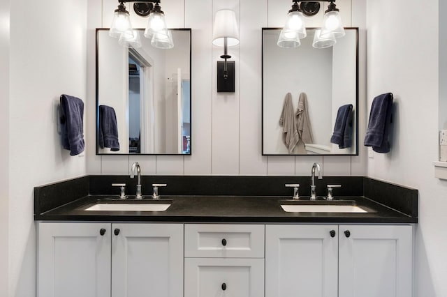 bathroom with vanity and backsplash