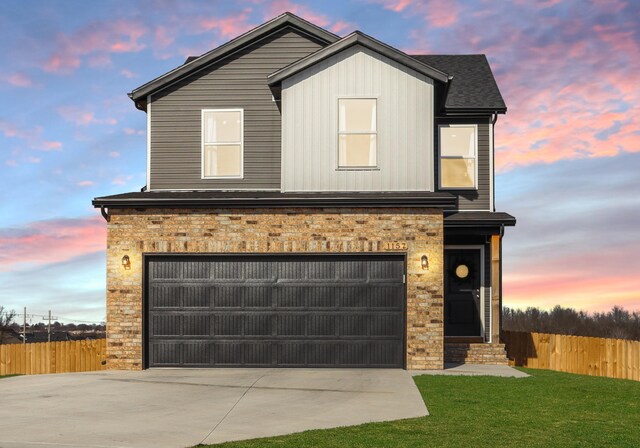 front of property with a garage