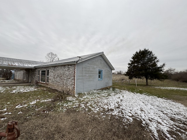 view of snow covered property