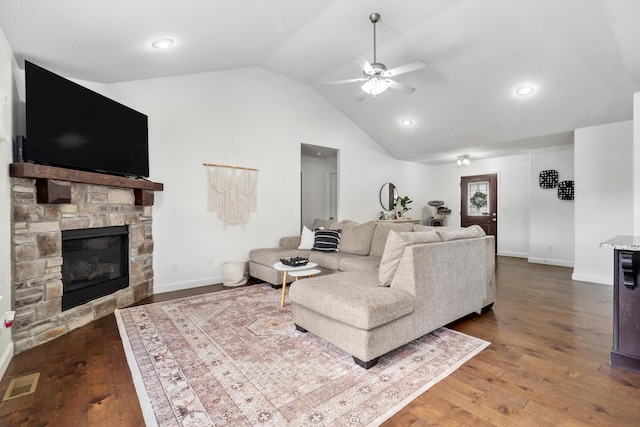 living room with a fireplace, wood-type flooring, ceiling fan, and lofted ceiling