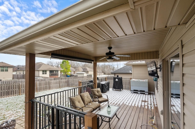 wooden terrace with outdoor lounge area and ceiling fan