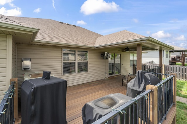 deck with fence and ceiling fan