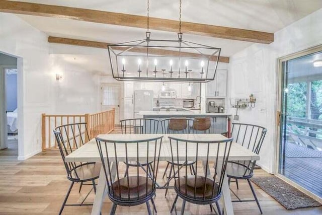 bar with white cabinetry, light hardwood / wood-style flooring, a notable chandelier, white appliances, and decorative light fixtures