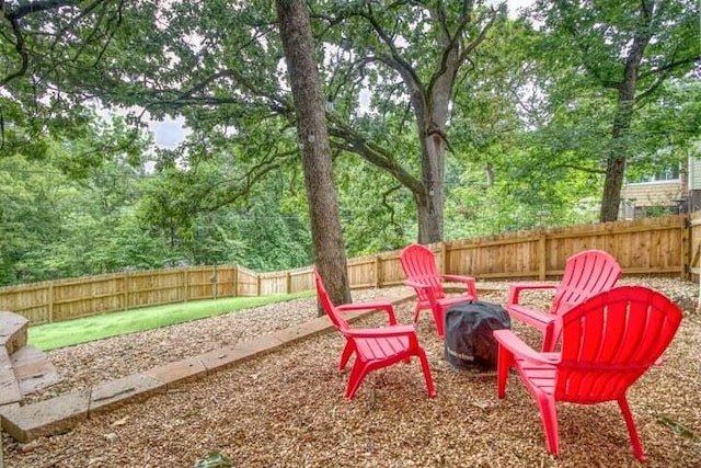 view of patio featuring a fire pit