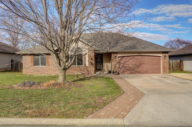 single story home with a garage and a front yard