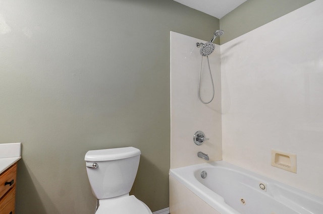 full bathroom with vanity, toilet, and tiled shower / bath