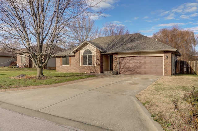 ranch-style house with a front yard and a garage