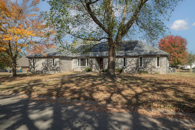 view of front of home with a front yard