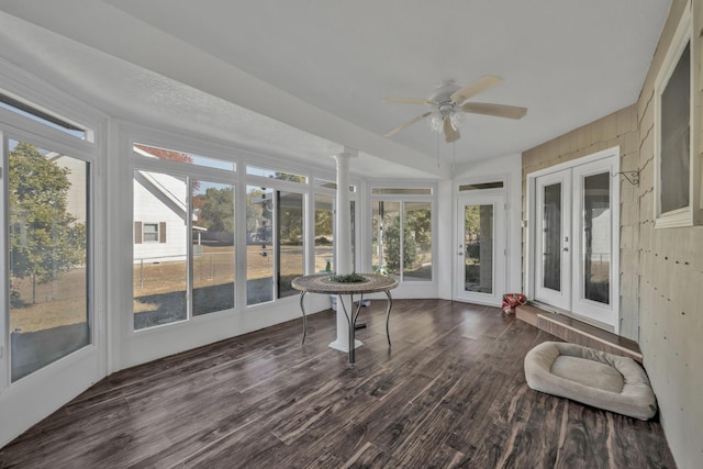 unfurnished sunroom with french doors and ceiling fan