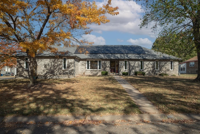 view of front of property with a front lawn