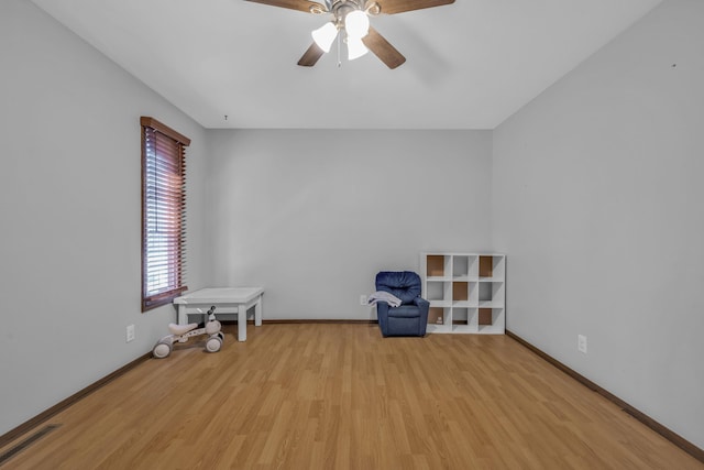 interior space featuring light hardwood / wood-style flooring and ceiling fan