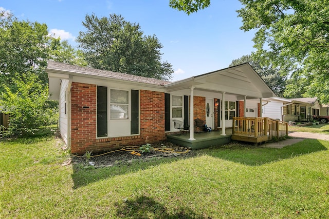 view of front of home featuring a porch and a front lawn