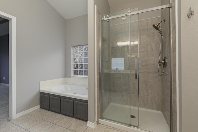 bathroom featuring separate shower and tub and tile patterned flooring