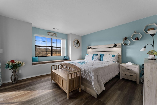 bedroom featuring dark wood-type flooring