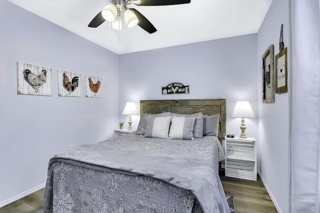 bedroom featuring ceiling fan and dark hardwood / wood-style flooring