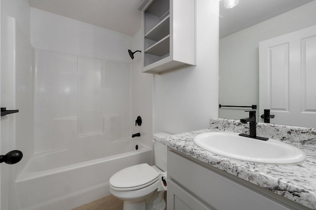 full bathroom with shower / tub combination, vanity, and toilet