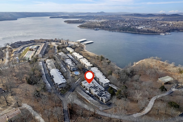 birds eye view of property featuring a water view