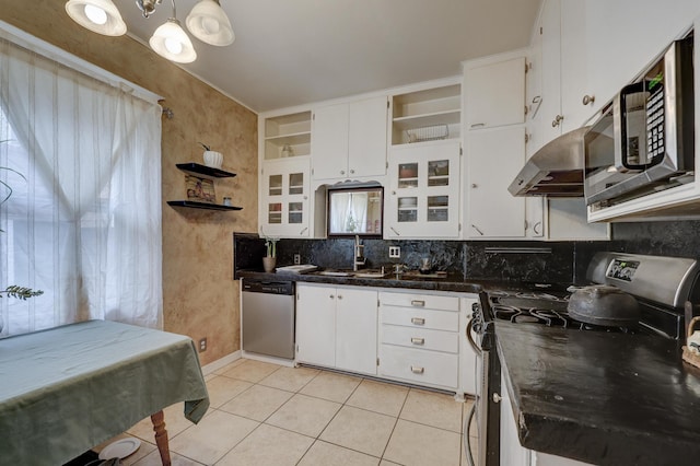 kitchen featuring black / electric stove, dishwasher, and white cabinets