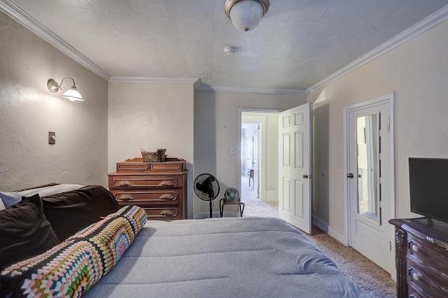 carpeted bedroom featuring crown molding