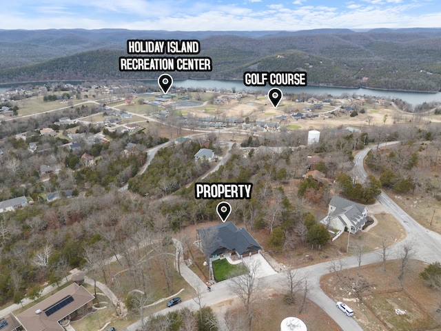 bird's eye view featuring a water and mountain view