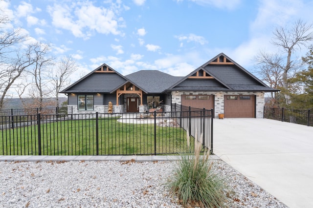 view of front facade with a garage and a front lawn