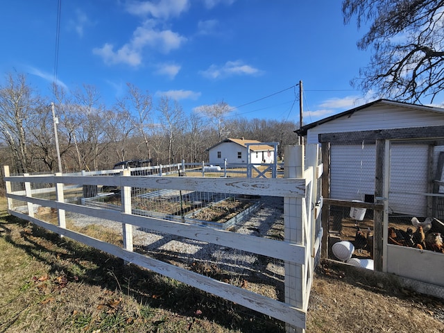 21525 State Highway P, Ava, MO 65608 - view of yard featuring a vegetable garden and an outdoor structure