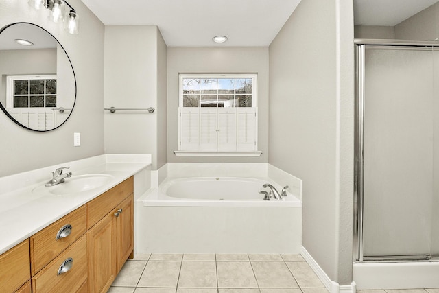 bathroom featuring tile patterned flooring, vanity, and independent shower and bath