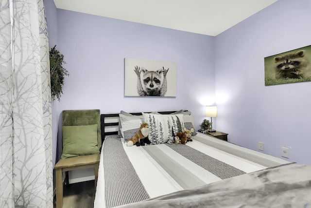 bedroom featuring wood-type flooring