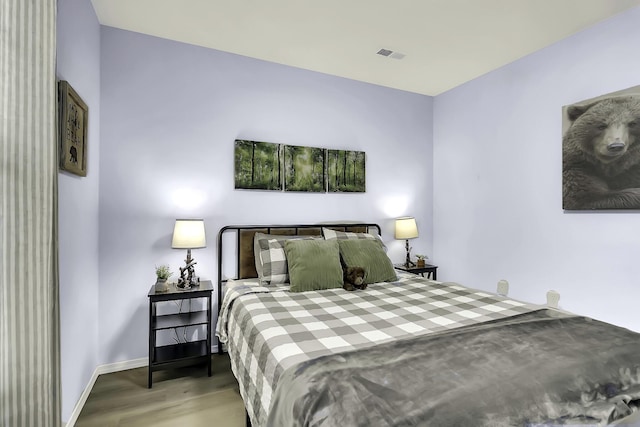 bedroom featuring light wood-type flooring