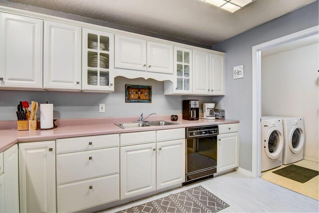 189 Avondale Dr Unit 91-6, Branson, MO 65616 - kitchen featuring dishwasher, independent washer and dryer, white cabinetry, and sink
