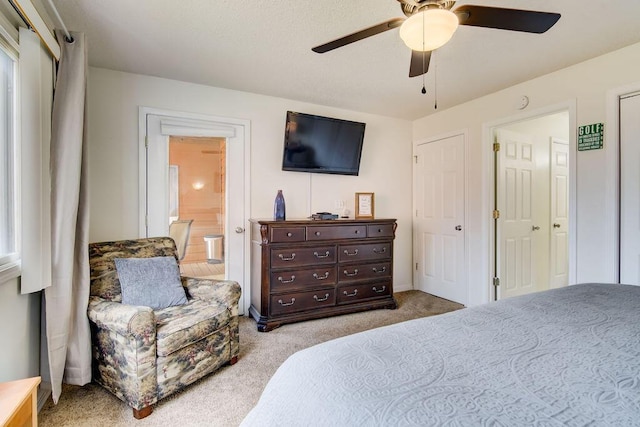 189 Avondale Dr Unit 91-6, Branson, MO 65616 - carpeted bedroom with ensuite bathroom and ceiling fan