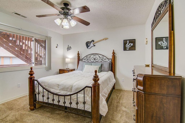 189 Avondale Dr Unit 91-6, Branson, MO 65616 - bedroom featuring a textured ceiling, carpet floors, and ceiling fan