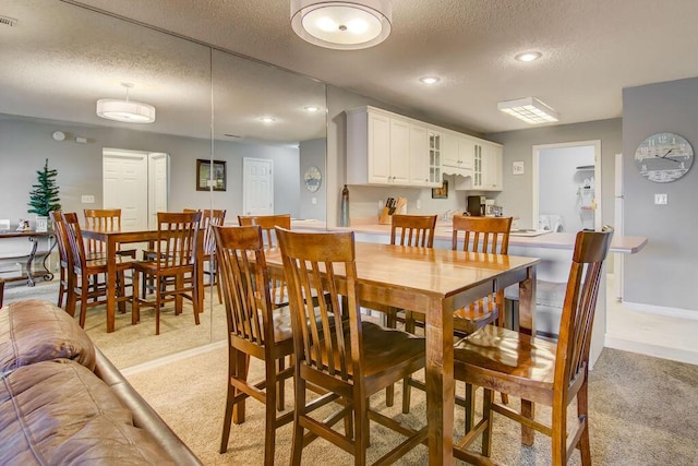 189 Avondale Dr Unit 91-6, Branson, MO 65616 - carpeted dining area featuring a textured ceiling