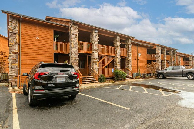 189 Avondale Dr Unit 91-6, Branson, MO 65616 - view of building exterior with cooling unit