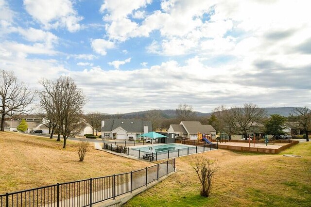 189 Avondale Dr Unit 91-6, Branson, MO 65616 - view of pool with a lawn