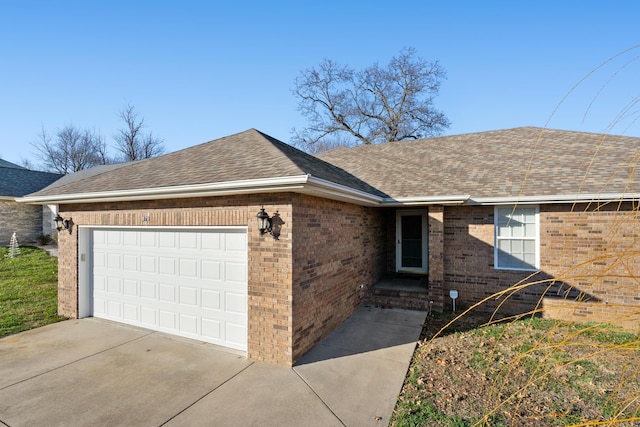 ranch-style house featuring a garage