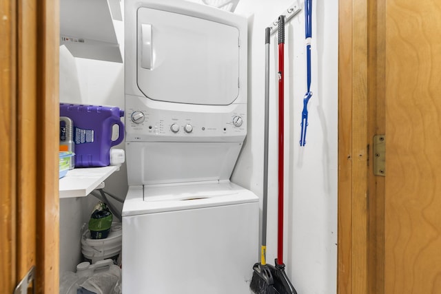 laundry room featuring stacked washing maching and dryer