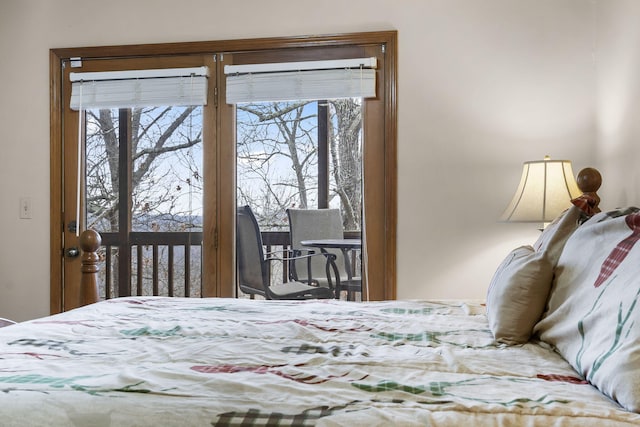 bedroom featuring multiple windows