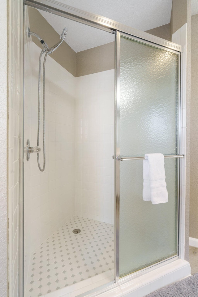 bathroom featuring walk in shower