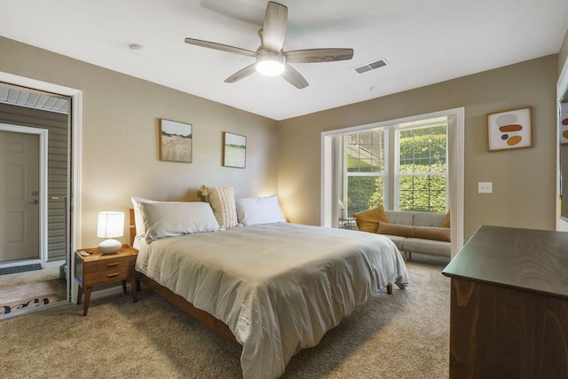 bedroom with light colored carpet and ceiling fan