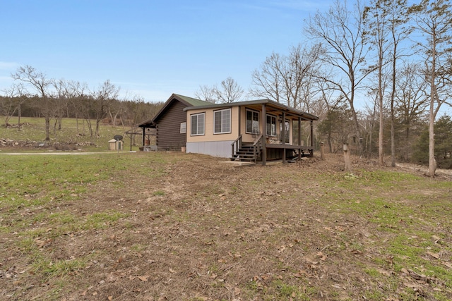 view of property exterior with a lawn