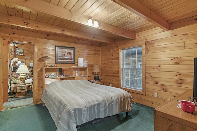 carpeted bedroom with beamed ceiling, wood ceiling, and wood walls