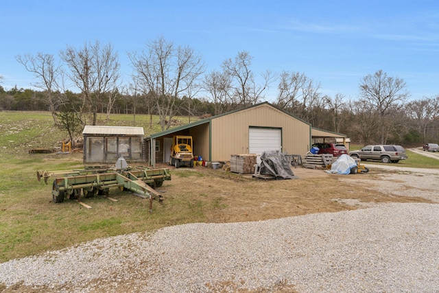 view of outdoor structure featuring a garage