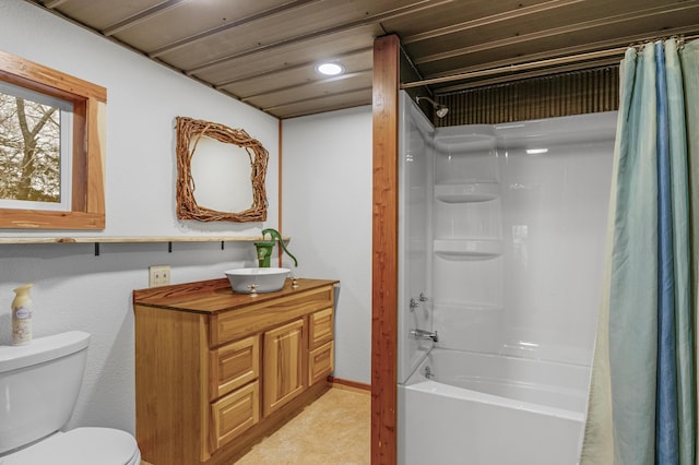 full bathroom with vanity, toilet, and shower / tub combo with curtain