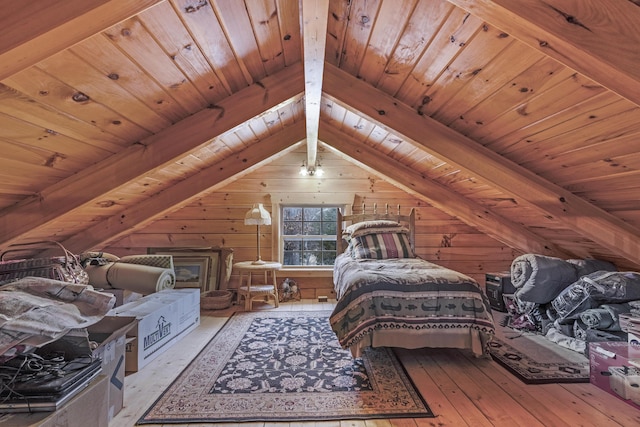 bedroom featuring light hardwood / wood-style floors, wood ceiling, and wood walls