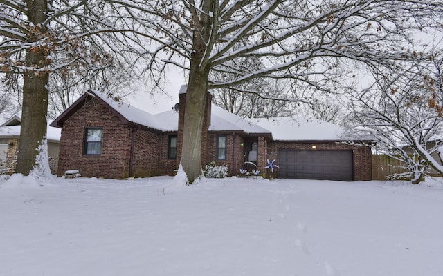 single story home with a garage