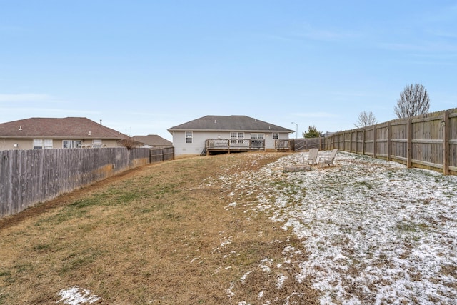 view of yard with a wooden deck