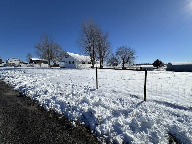 view of yard covered in snow